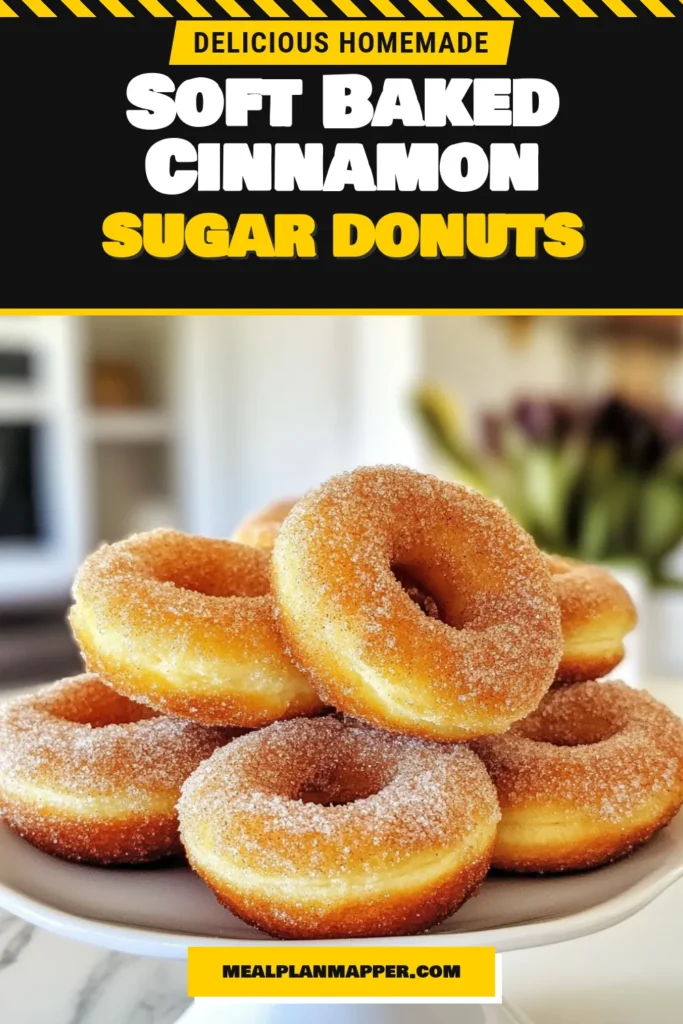 Indulge in these soft baked donuts coated in sweet cinnamon sugar! This easy donut recipe is perfect for creating homemade donuts that everyone will love. Light, fluffy, and bursting with flavor, these baked cinnamon donuts are sure to become a family favorite. Ready in just 30 minutes, they're ideal for any occasion. Don't forget to save this delightful recipe for your next baking adventure! #BakedDonuts #CinnamonSugarDonuts #EasyDonutRecipe #HomemadeDonuts
